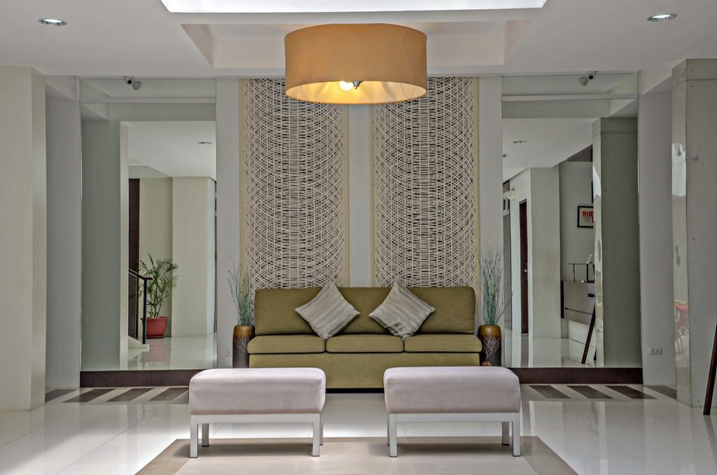 Empire Suites Hotel Puerto Princesa Buitenkant foto