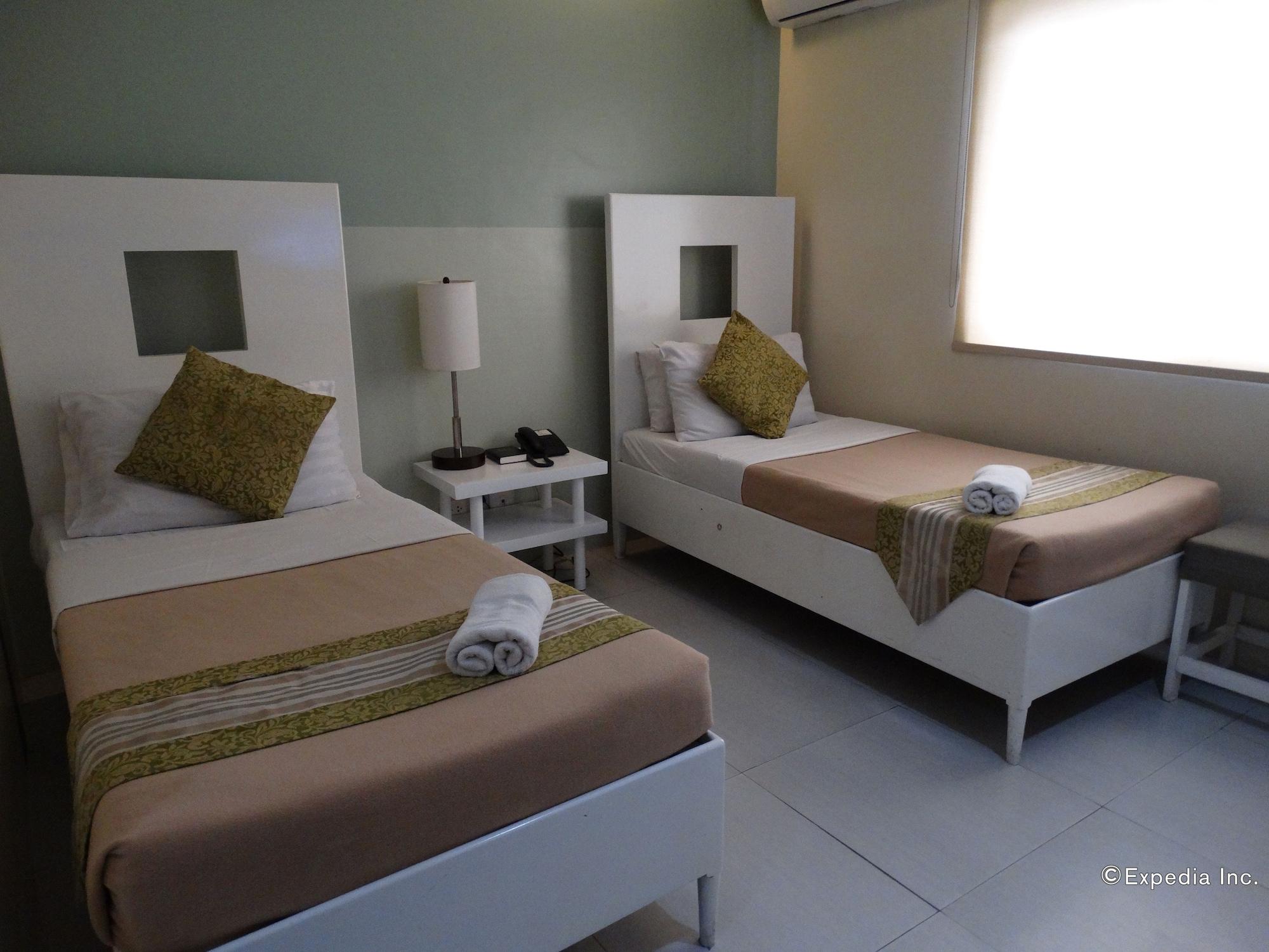 Empire Suites Hotel Puerto Princesa Buitenkant foto