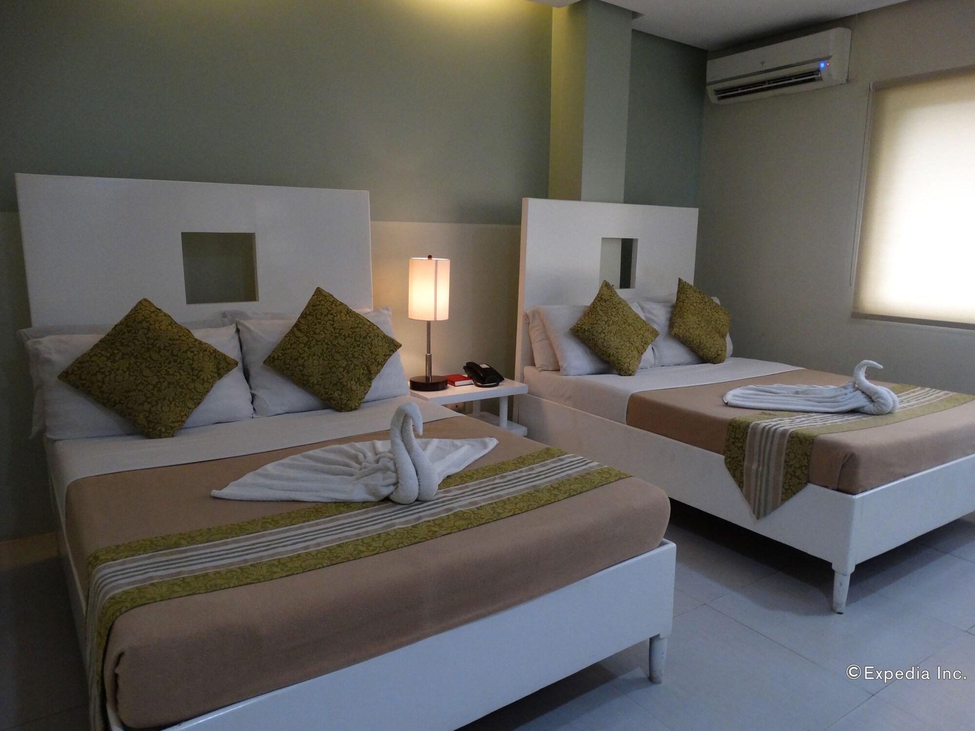 Empire Suites Hotel Puerto Princesa Buitenkant foto
