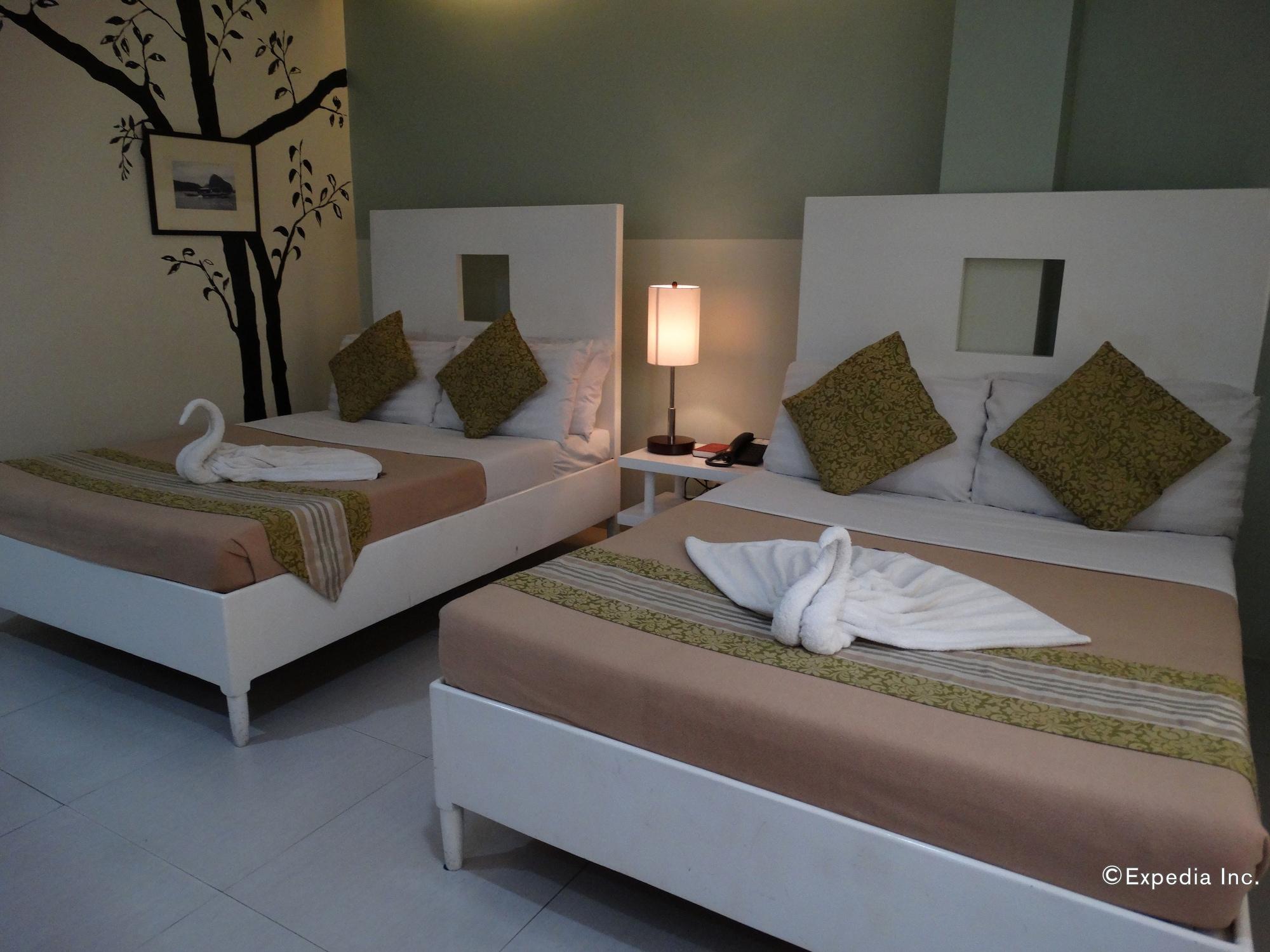 Empire Suites Hotel Puerto Princesa Buitenkant foto