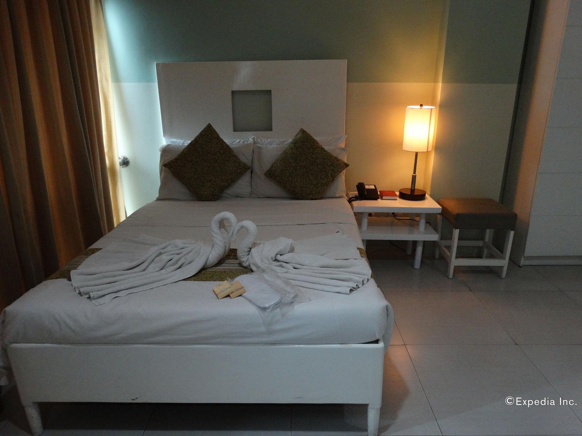 Empire Suites Hotel Puerto Princesa Buitenkant foto