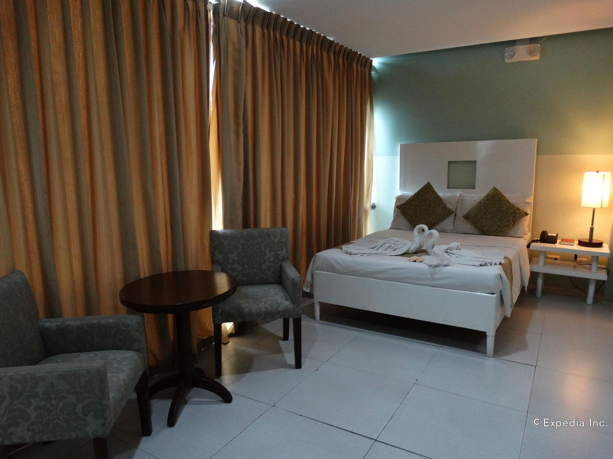 Empire Suites Hotel Puerto Princesa Buitenkant foto