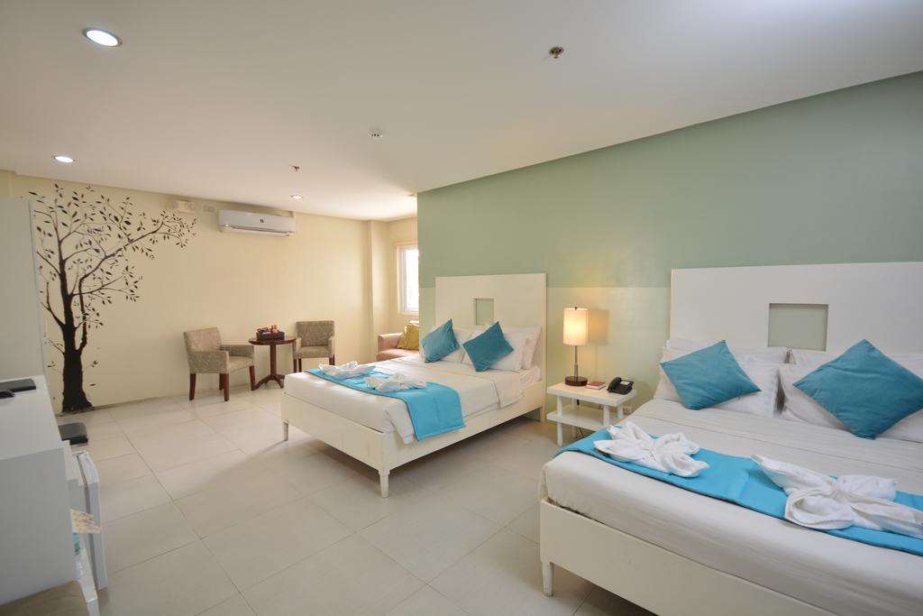 Empire Suites Hotel Puerto Princesa Buitenkant foto