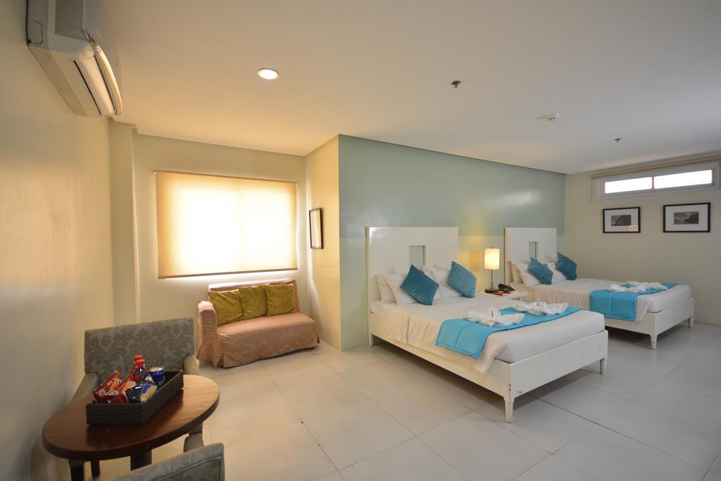 Empire Suites Hotel Puerto Princesa Buitenkant foto