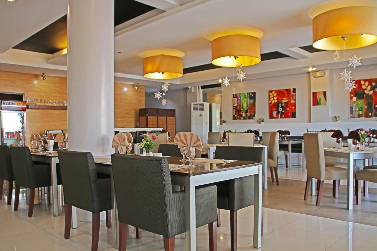 Empire Suites Hotel Puerto Princesa Buitenkant foto