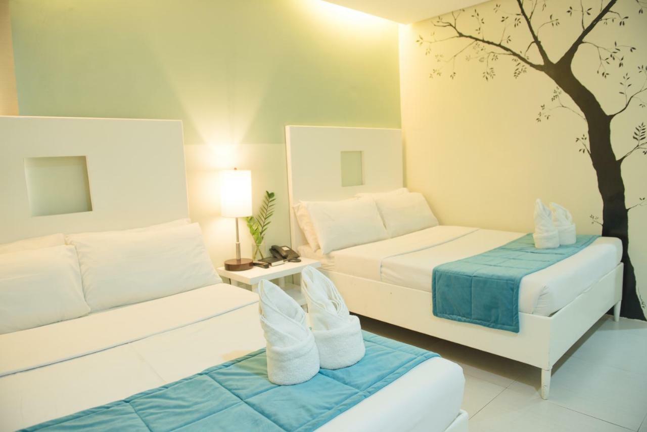 Empire Suites Hotel Puerto Princesa Buitenkant foto